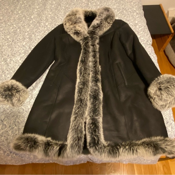 Fur trimmed long leather coat
